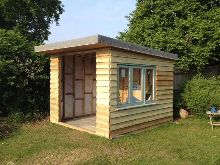 Garden studio clad and window fitted
